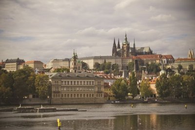 A picture of the Prague Castle behind the Vltava river.
